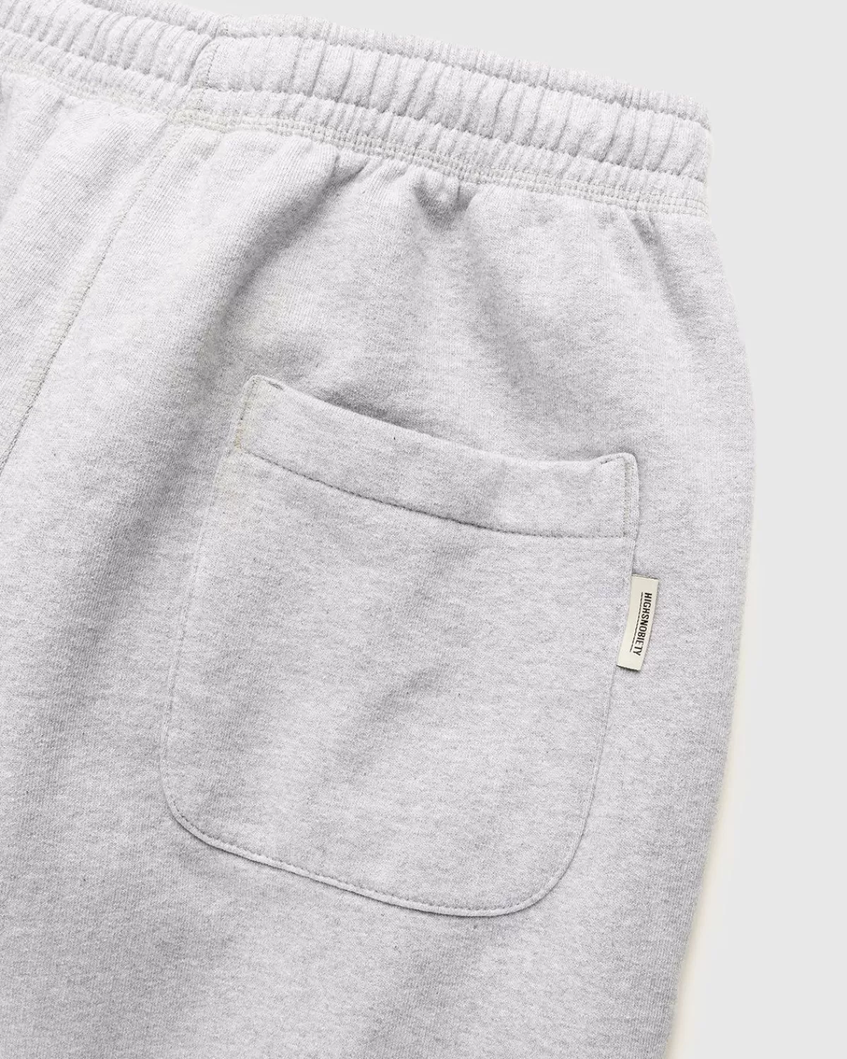 highsnobiety__logo_fleece_staples_broek_heather_grey_4.webp Broek^Highsnobiety - Logo Fleece Staples Broek Heather Grey