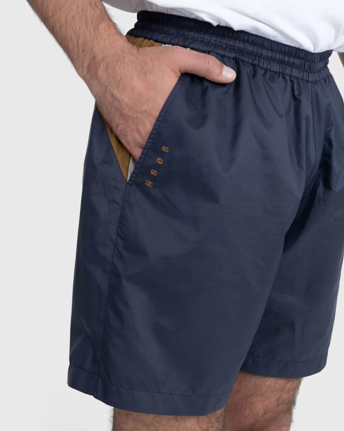 highsnobiety_mix_paneel_nylon_short_marineblauwbruin_1.webp Korte Broek^Highsnobiety Mix Paneel Nylon Short Marineblauw/Bruin