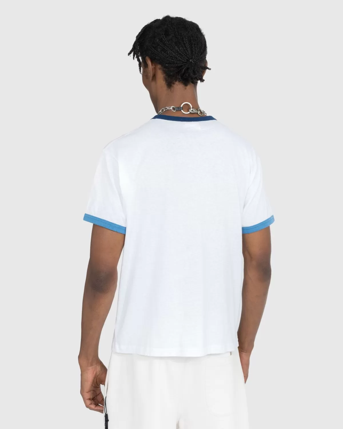 stockholm_surfboard_club_ringer_tshirt_wit_5.webp Stockholm Surfboard Club Ringer T-Shirt Wit Store