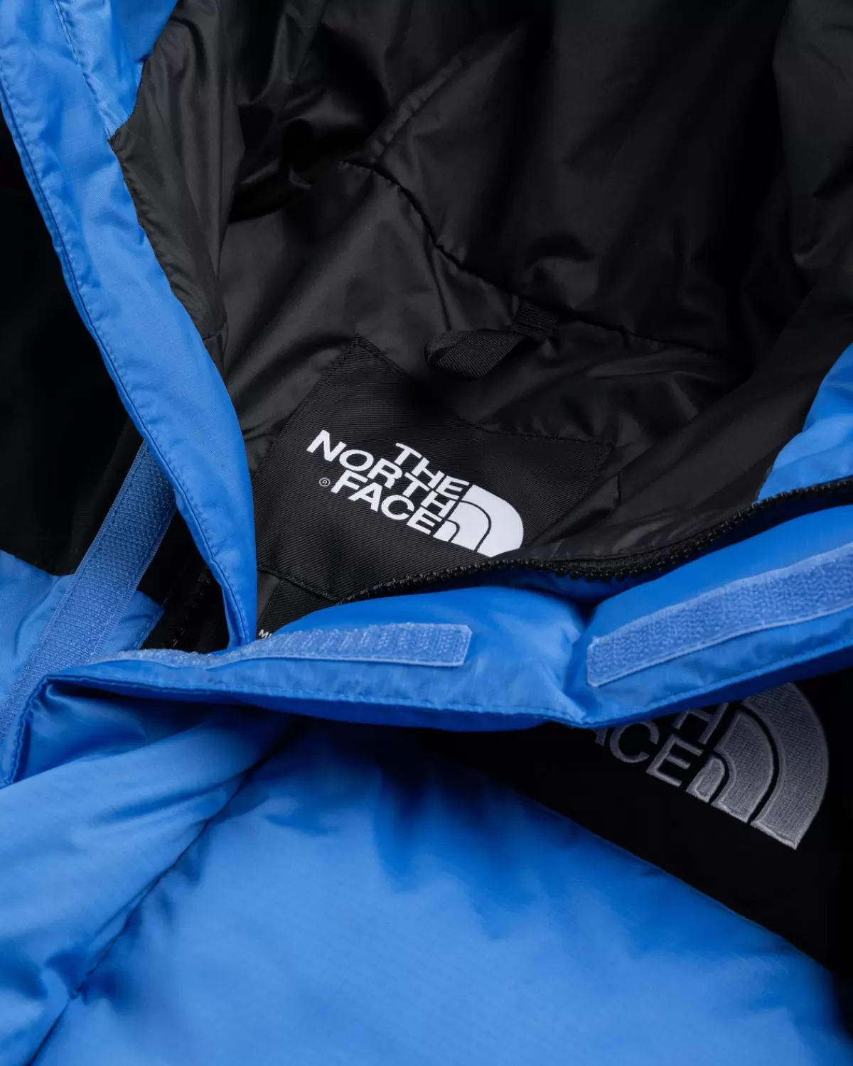 Bovenkleding^The North Face Himalayan Donsparka Super Sonic Blue/Tnf Zwart