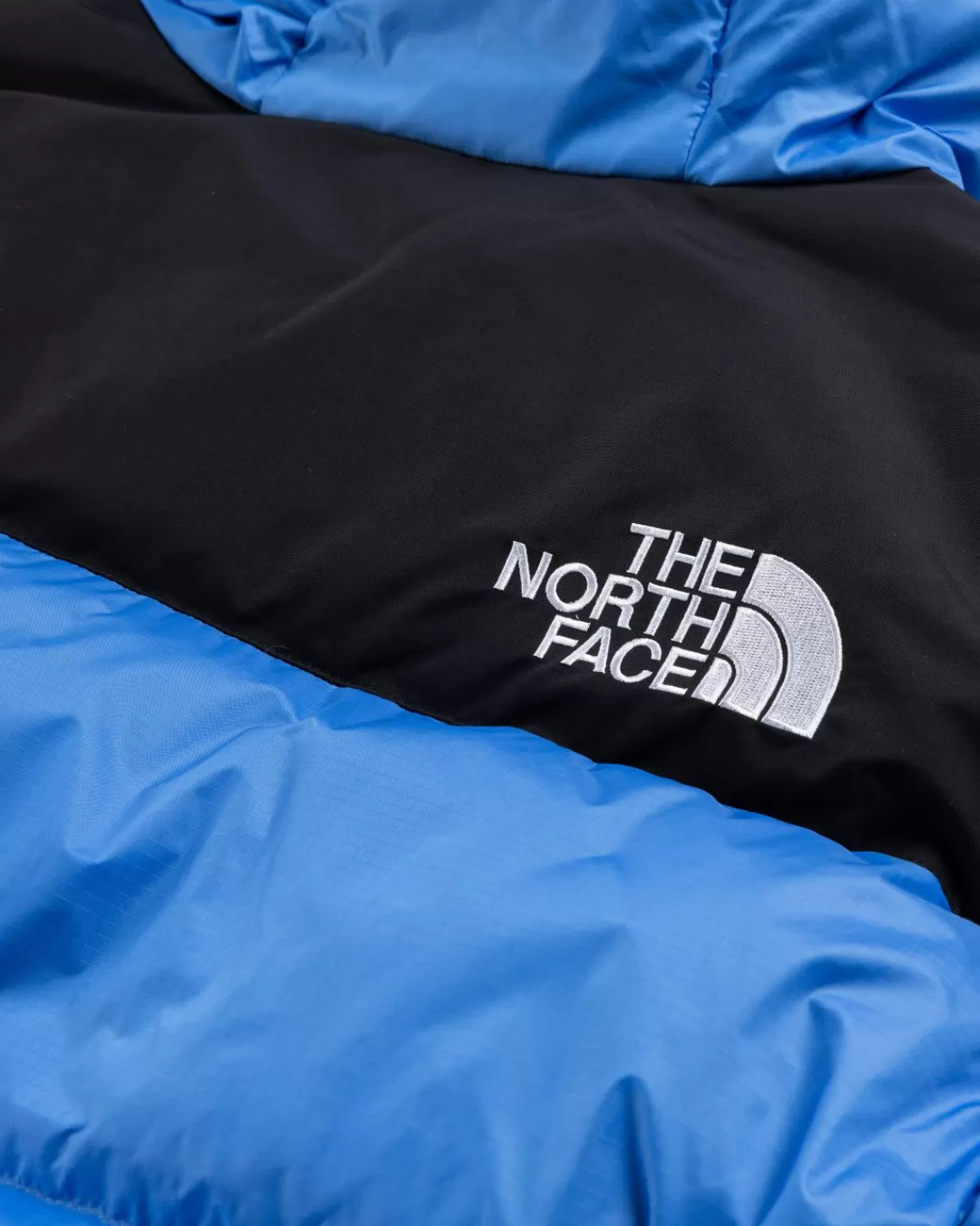 Bovenkleding^The North Face Himalayan Donsparka Super Sonic Blue/Tnf Zwart